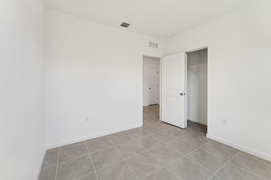 Spacious, unfurnished interior of a new home in Aspire at Port St. Lucie, Port St. Lucie (Image 22).