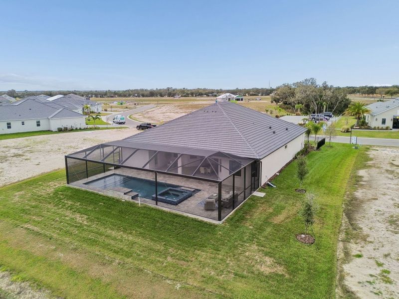 Exterior details and patio area of a home in River Preserve Estates, Parrish (Image 46).