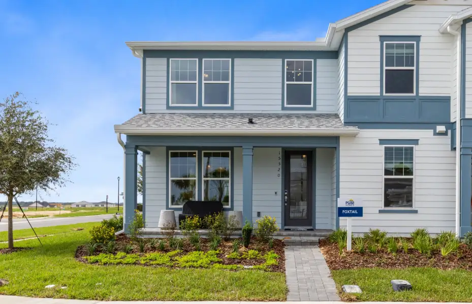 Representative exterior photo of a completed home built from the Foxtail - Exterior Unit by Pulte Homes in Hilliard Isle, Kissimmee, FL (Image 2). Representative exterior photo of a completed home built from the Foxtail - Exterior Unit by Pulte Homes in Hilliard Isle, Kissimmee, FL (Image 2).