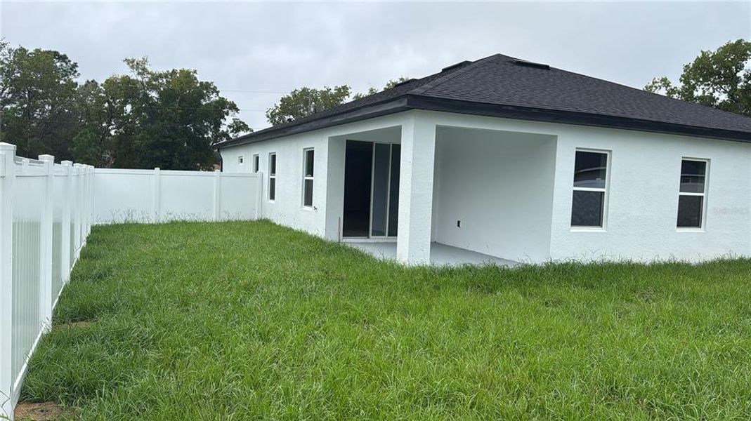 Front exterior of a new home in , Summerfield, FL, highlighting curb appeal (Image 26).