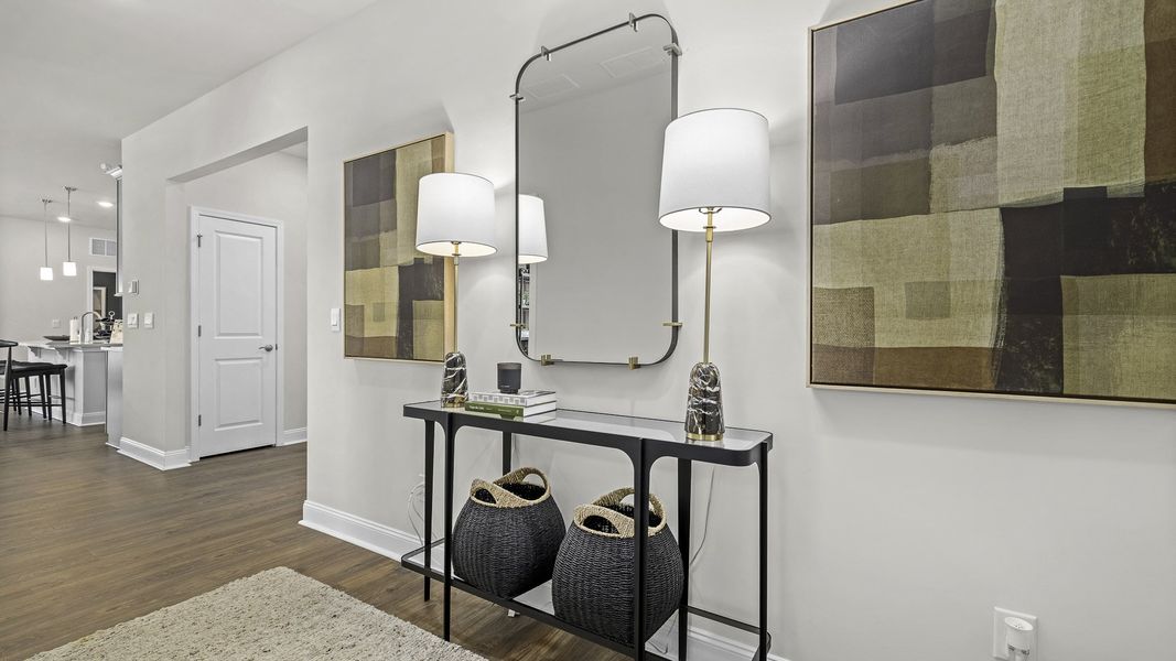 Furnished interior view inside a new home in The Villas at Kinsley, Jamestown (Image 3). Furnished interior view inside a new home in The Villas at Kinsley, Jamestown (Image 3).