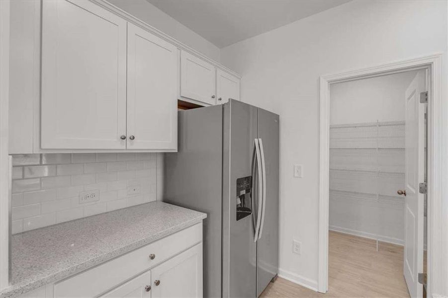 Furnished interior view inside a new home in The View at Groover's Lake, Lithia Springs (Image 11).