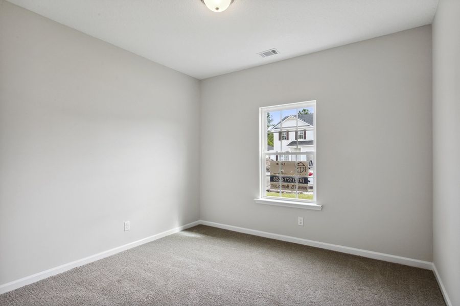 Representative unfurnished interior of a home built from the The Stafford by RTS Homes in The Pointe at Villages on Marne, Hinesville (Image 44).