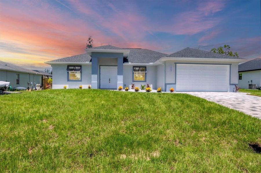 Front exterior of a new home in , Port Charlotte, FL, highlighting curb appeal (Image 26). Front exterior of a new home in , Port Charlotte, FL, highlighting curb appeal (Image 26).