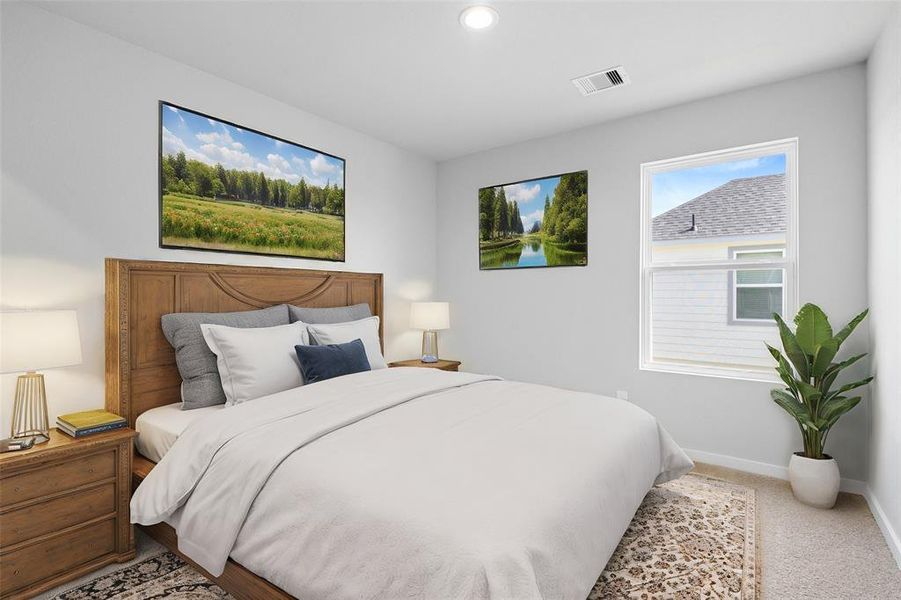 Secondary bedroom features plush carpet, custom paint, lighting, large window with privacy blinds and access to a private bath.