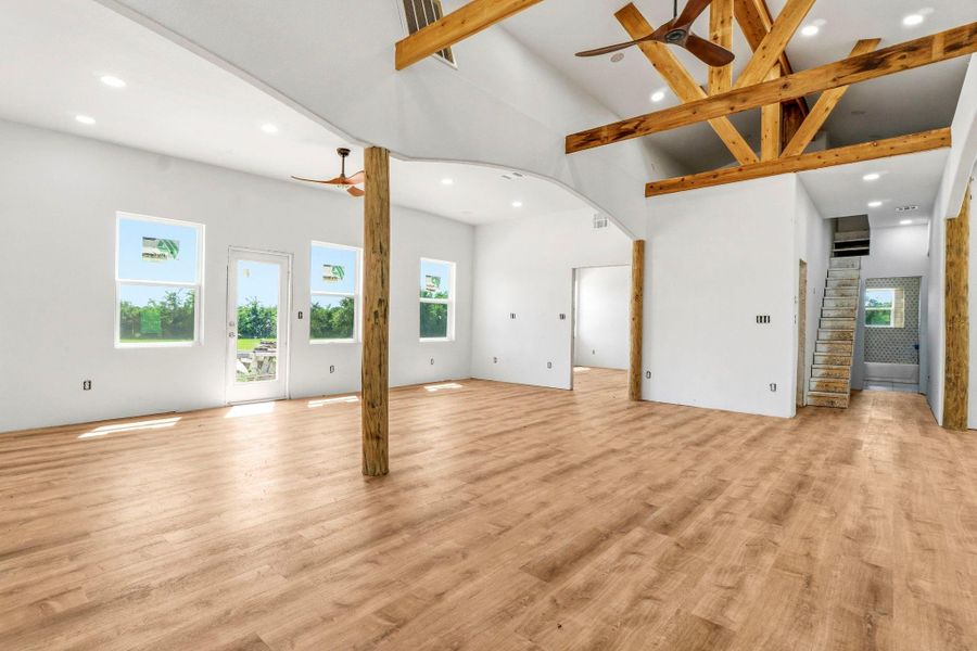 Tastefully selected laminate flooring throughout, no carpet! To the right of the entry you'll see steps leading to the second level loft, perfect for storage or playroom.