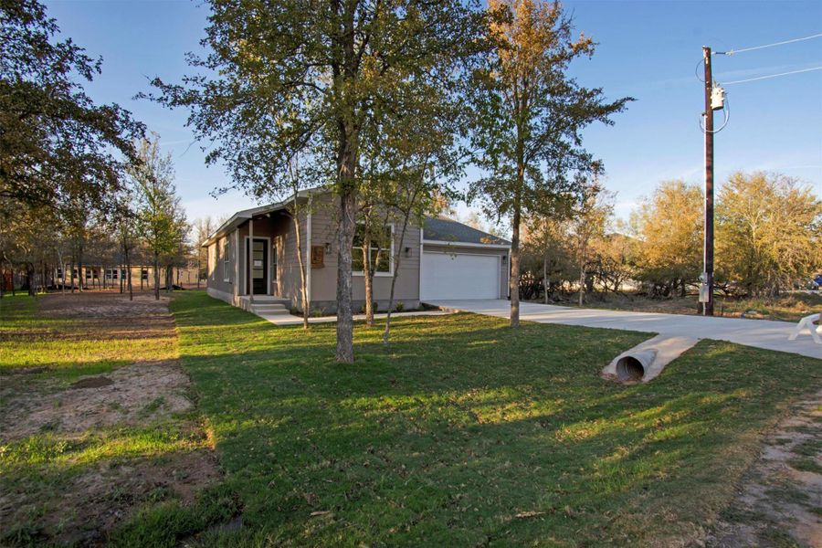 Exterior details and patio area of a home in , Bastrop (Image 25).