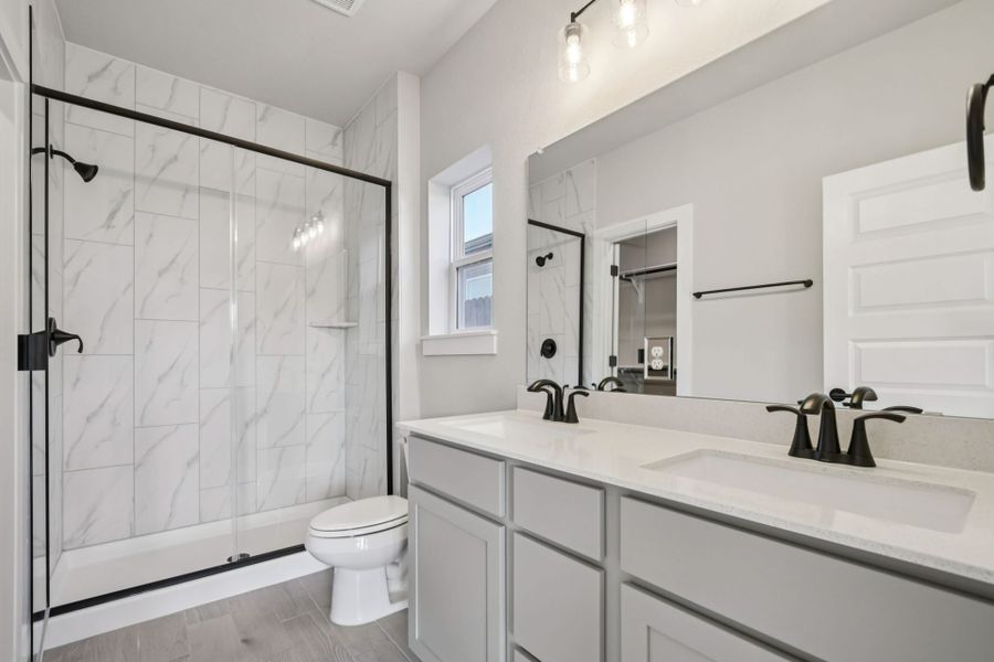 Furnished interior view inside a new home in Whisper Valley, Manor (Image 9).