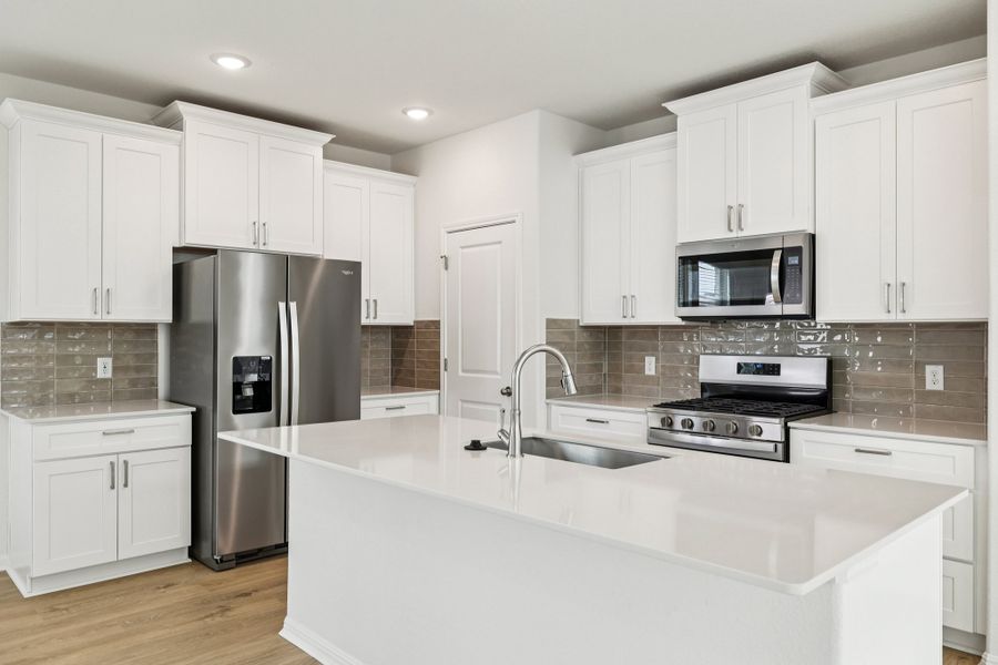 Furnished interior view inside a new home in Crosswinds, Kyle (Image 5).