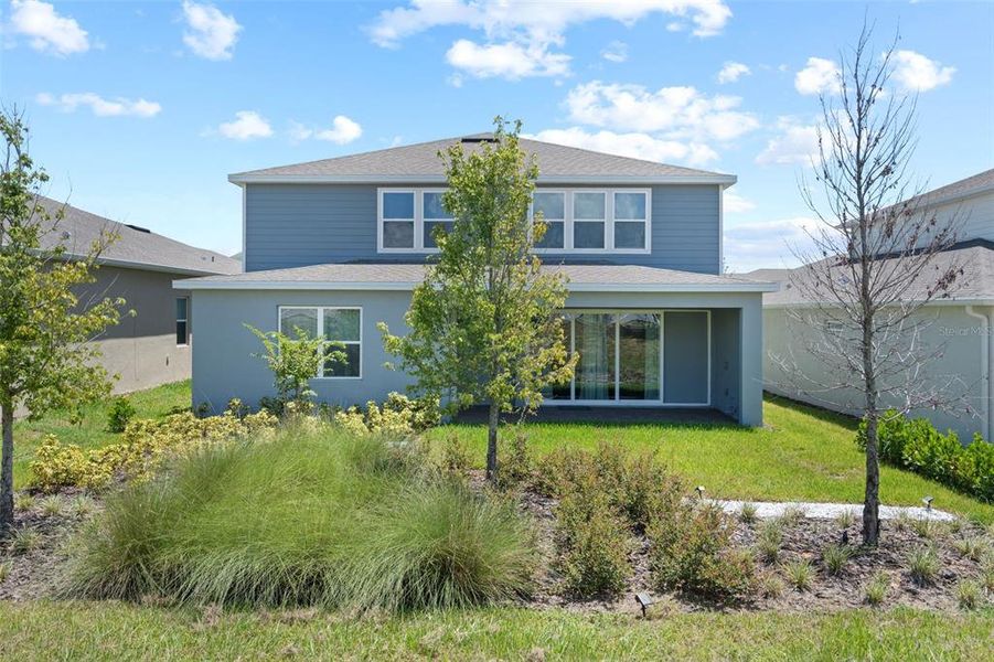 Front exterior of a new home in , Montverde, FL, highlighting curb appeal (Image 19).