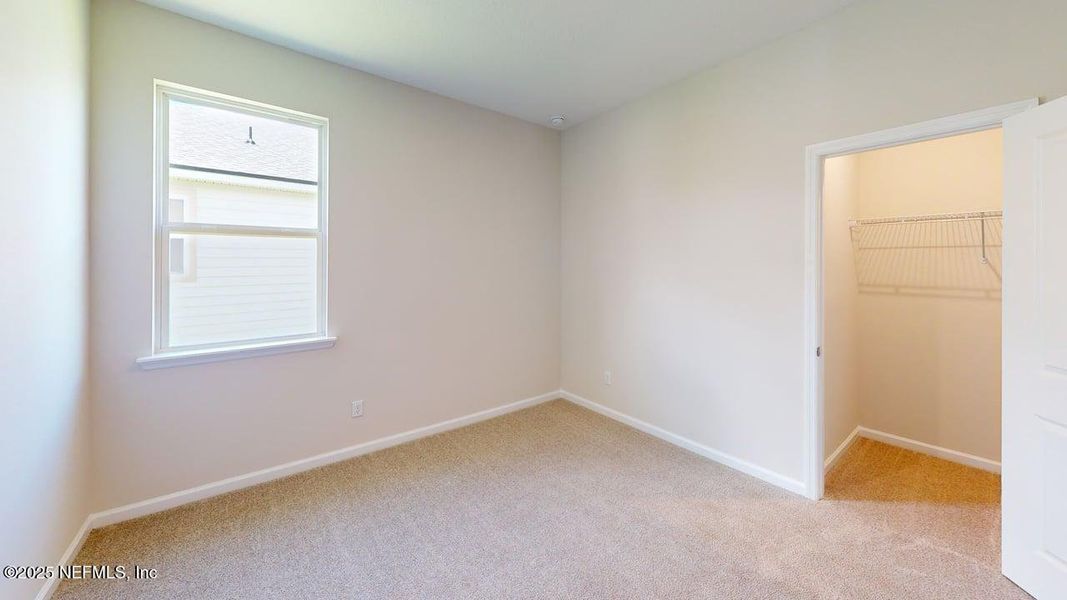 Spacious, unfurnished interior of a new home in Lakes at Bella Lago, Green Cove Springs (Image 12).