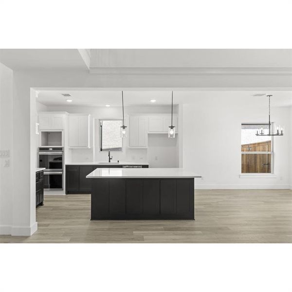 Furnished interior view inside a new home in Trails at Cottonwood Creek, Rowlett (Image 17).