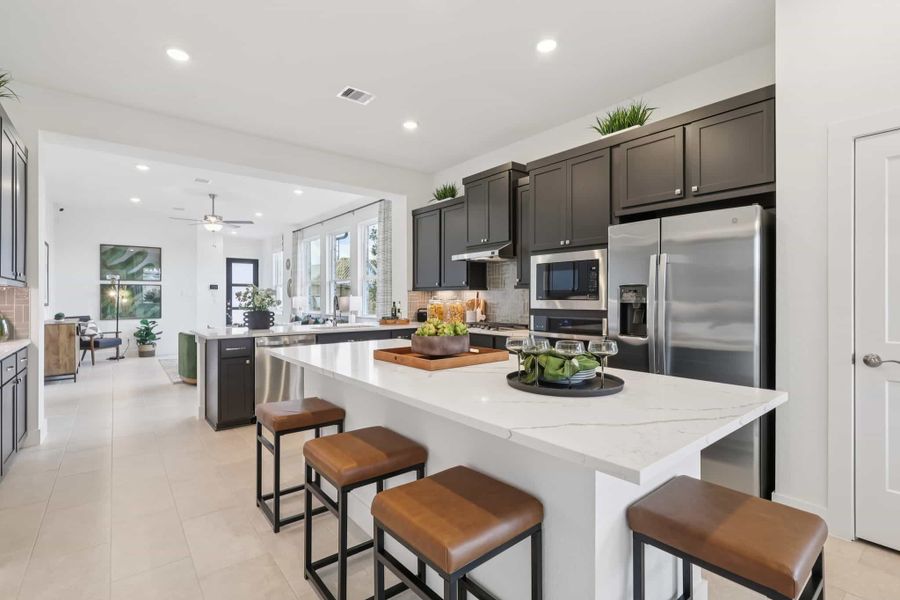 Furnished interior view inside a new home in Sunterra, Katy (Image 8).