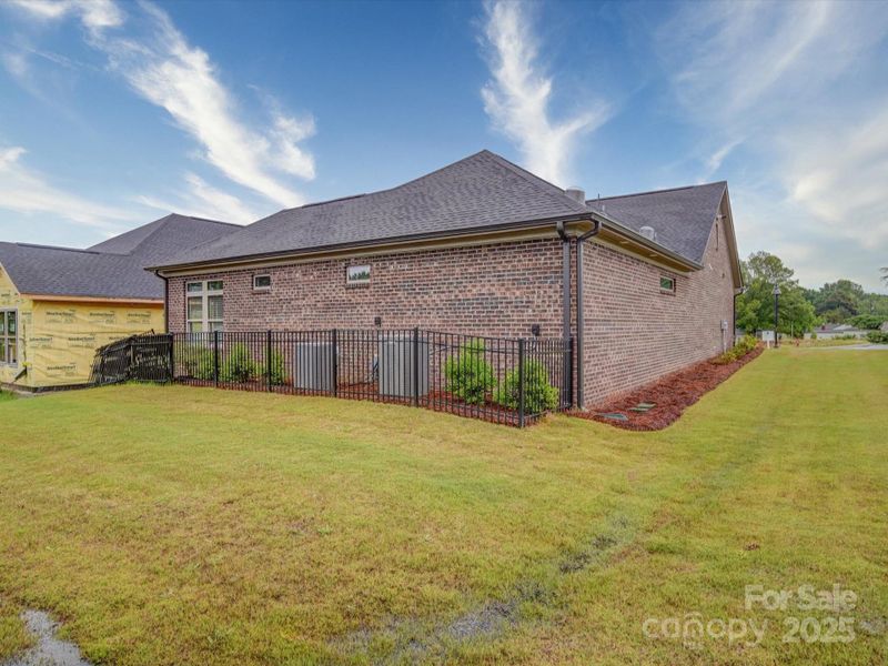 Exterior details and patio area of a home in The Courtyards on New Hope, Gastonia (Image 3).