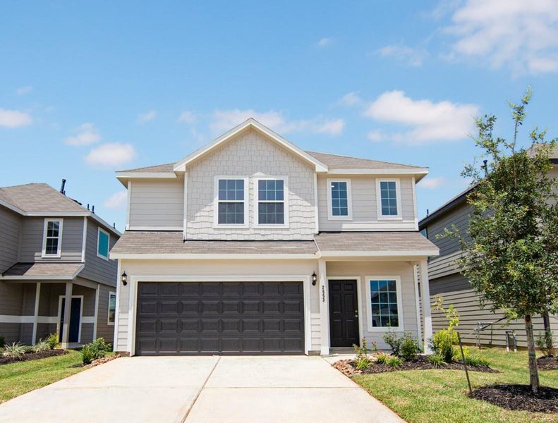 Front exterior of a new home in Cliffstone Hills, Conroe, TX, highlighting curb appeal (Image 13). Front exterior of a new home in Cliffstone Hills, Conroe, TX, highlighting curb appeal (Image 13).