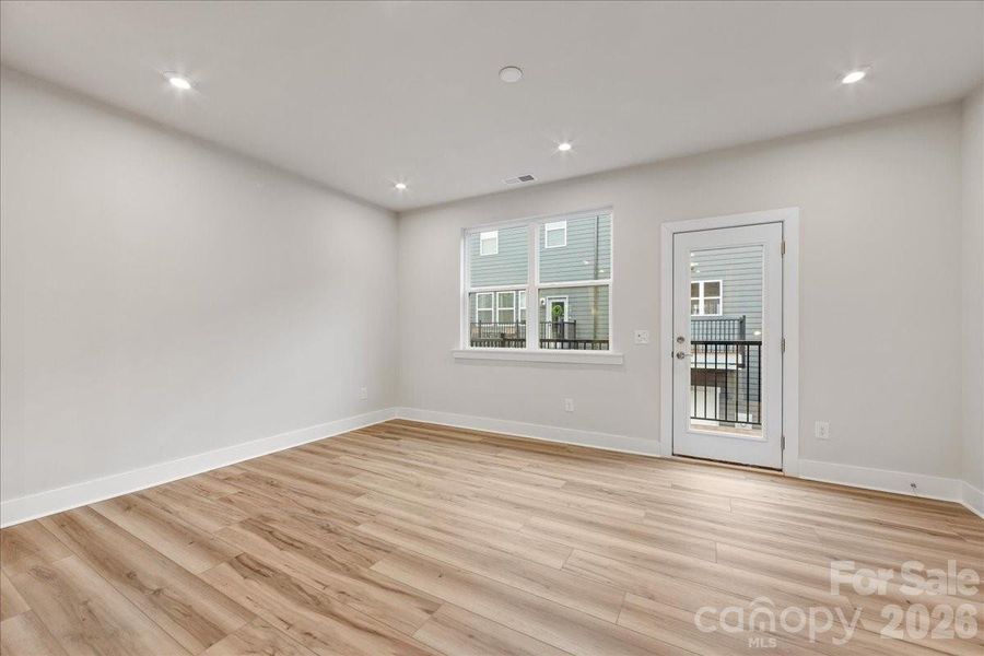 Living Room with Access to the Second Floor Outdoor Living
