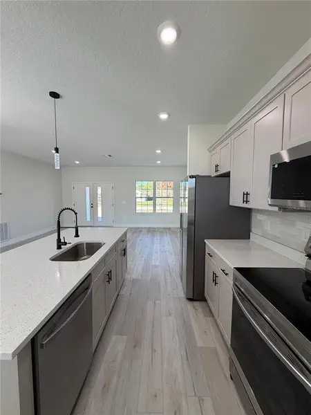 Furnished interior view inside a new home in , Sebring (Image 8).