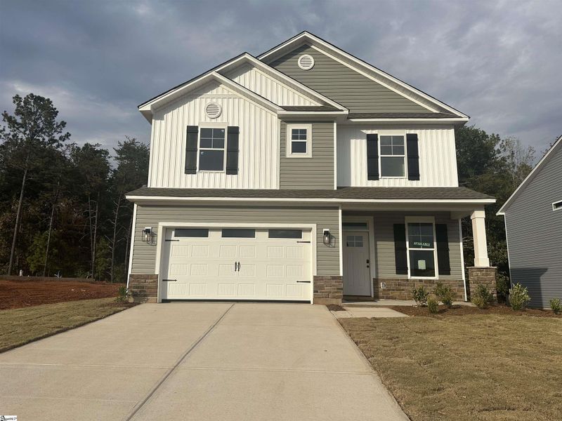 Front exterior of a new home in Shiloh Trail, Wellford, SC, highlighting curb appeal (Image 1). Front exterior of a new home in Shiloh Trail, Wellford, SC, highlighting curb appeal (Image 1).