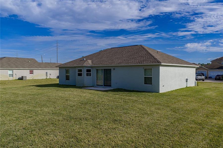 Exterior details and patio area of a home in , Sebring (Image 3).