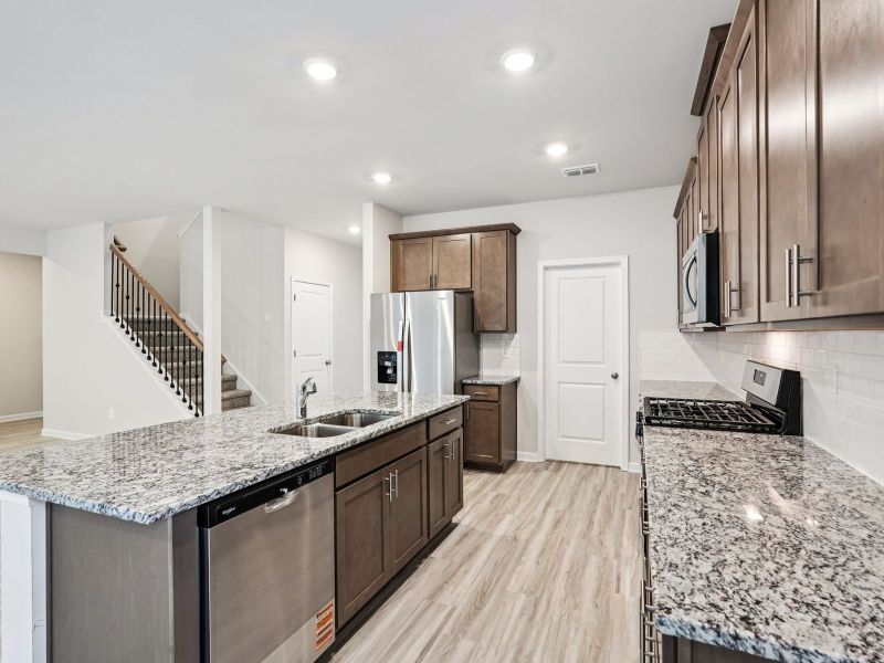 Furnished interior view inside a new home in Martin Springs - Estate Series, Lawrenceville (Image 7). Furnished interior view inside a new home in Martin Springs - Estate Series, Lawrenceville (Image 7).