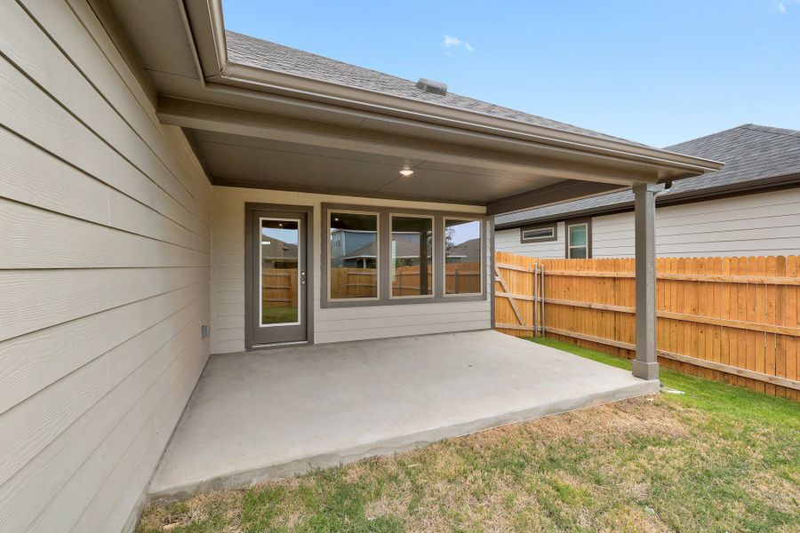 Exterior details and patio area of a home in Prairie Winds, Hutto (Image 4). Exterior details and patio area of a home in Prairie Winds, Hutto (Image 4).