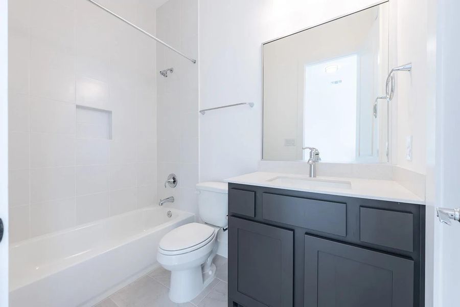 Furnished interior view inside a new home in Caliterra - 110', Dripping Springs (Image 11). Furnished interior view inside a new home in Caliterra - 110', Dripping Springs (Image 11).