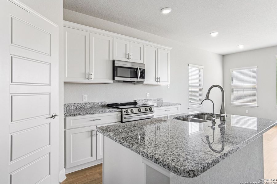 Furnished interior view inside a new home in Magnolia Village North, San Antonio (Image 13).