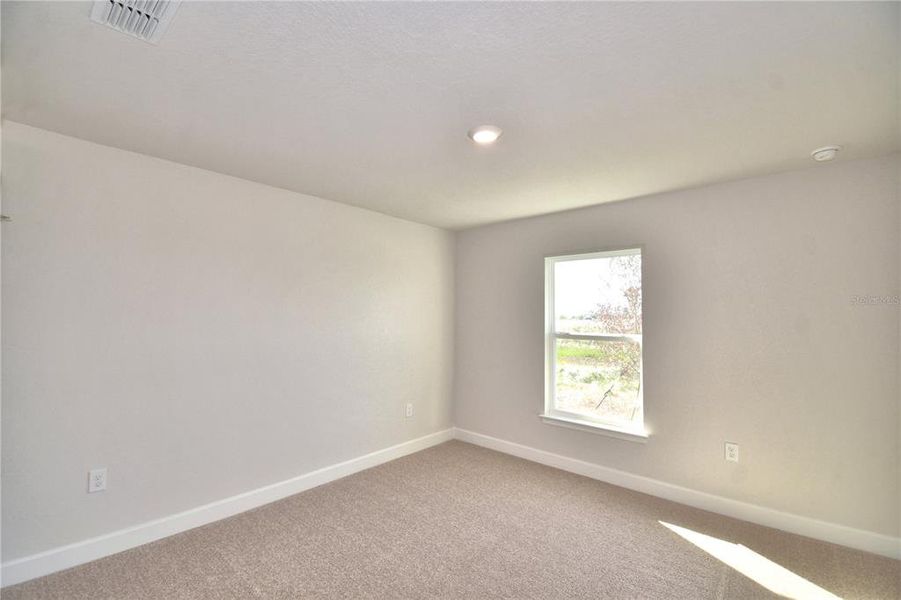Spacious, unfurnished interior of a new home in Cadence Crossing, Auburndale (Image 21).