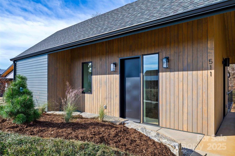 Exterior details and patio area of a home in , Asheville (Image 31).