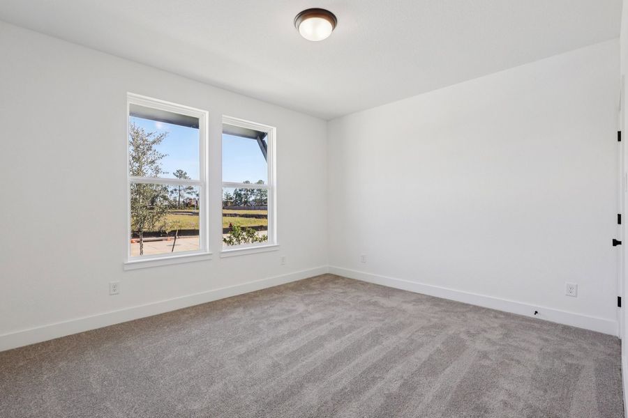 Spacious, unfurnished interior of a new home in The Canopies, Splendora (Image 4).