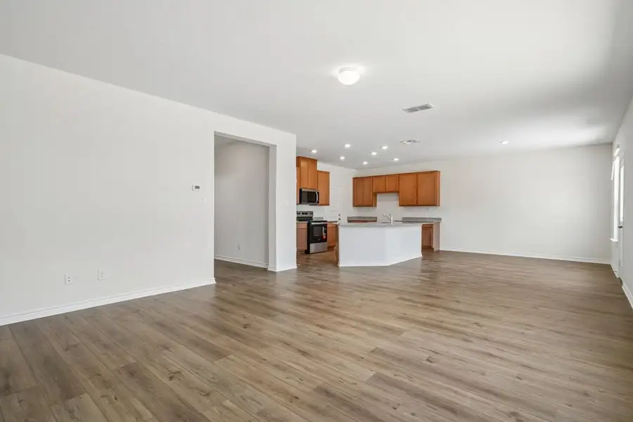 Spacious, unfurnished interior of a new home in Preserve at Culebra - Sterling Collection, San Antonio (Image 17).