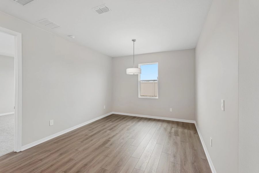 Dining nook located just of the kitchen