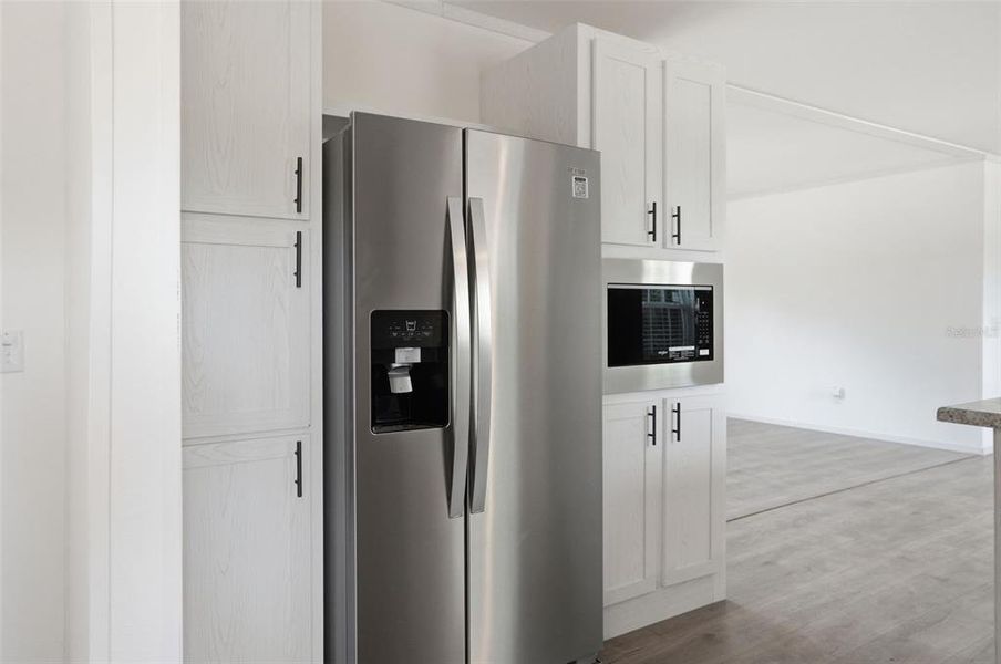 Furnished interior view inside a new home in , Weeki Wachee (Image 6).