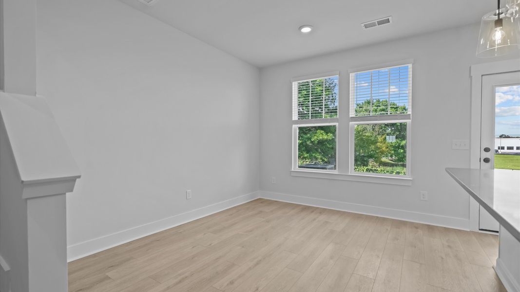 Open-concept dining area with thoughtful flow—perfect for entertaining in this first-class home Open-concept dining area with thoughtful flow—perfect for entertaining in this first-class home