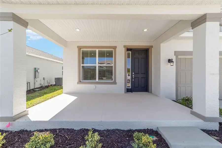 Exterior details and patio area of a home in Calesa Township, Ocala (Image 28).
