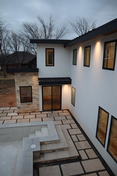 Exterior details and patio area of a home in , Granbury (Image 27).
