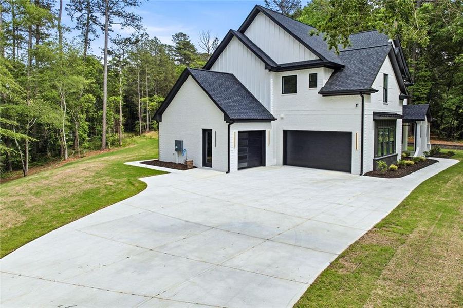 Front exterior of a new home in , Lawrenceville, GA, highlighting curb appeal (Image 26).