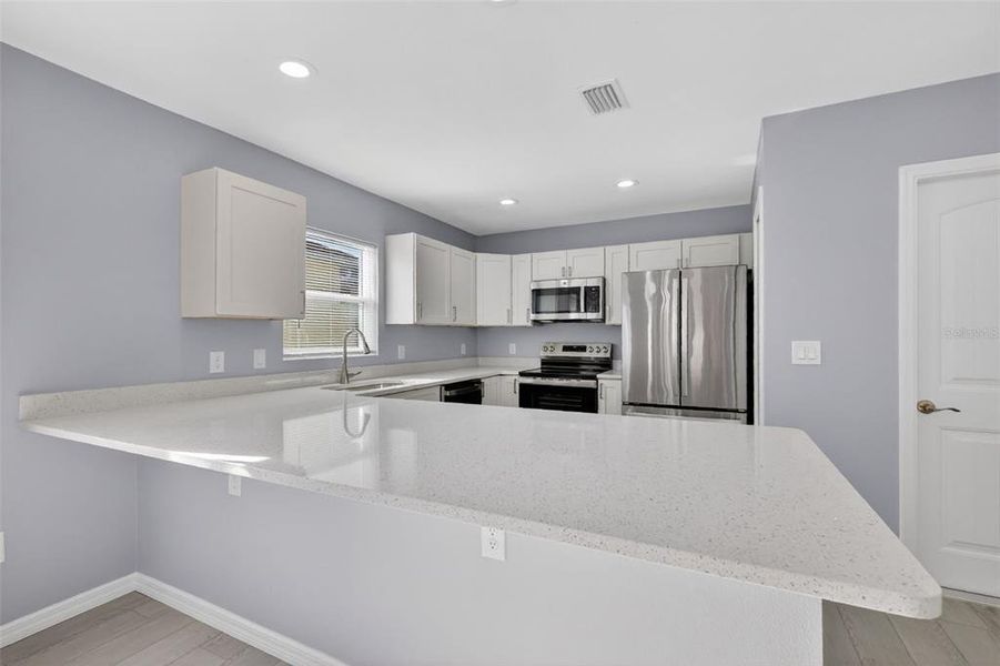 Furnished interior view inside a new home in , The Villages (Image 6).