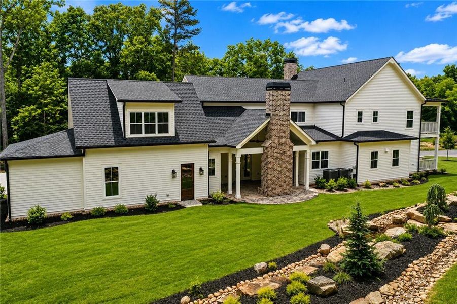 Front exterior of a new home in , Dacula, GA, highlighting curb appeal (Image 28). Front exterior of a new home in , Dacula, GA, highlighting curb appeal (Image 28).