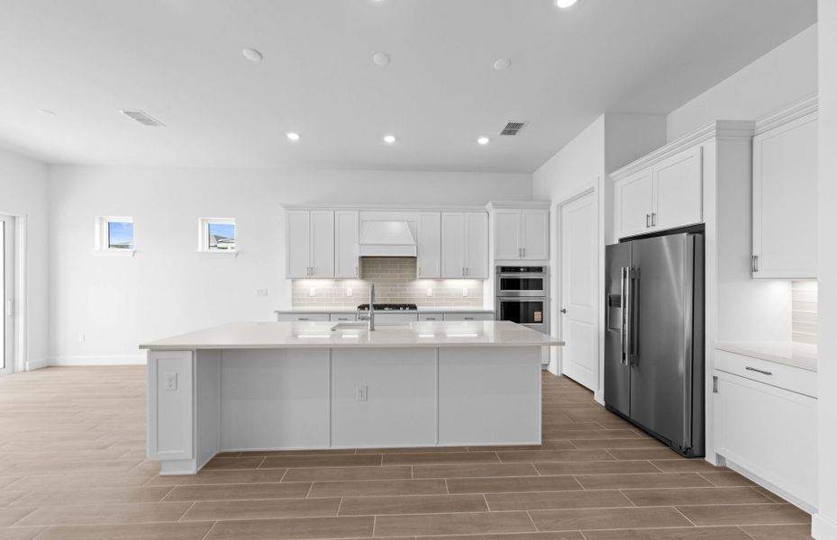 Furnished interior view inside a new home in BeachWalk by Manasota Key, Englewood (Image 17).