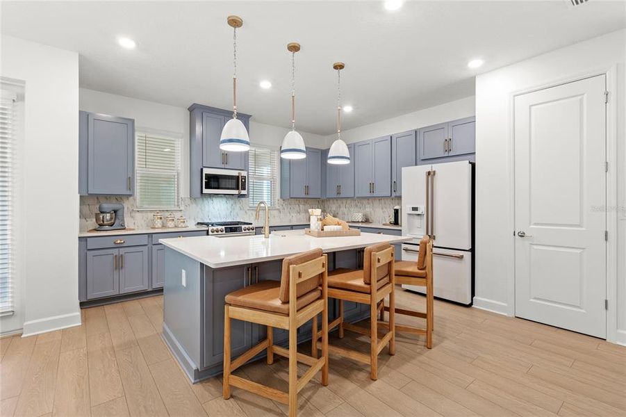 Furnished interior view inside a new home in Harvest at Ovation, Winter Garden (Image 7).