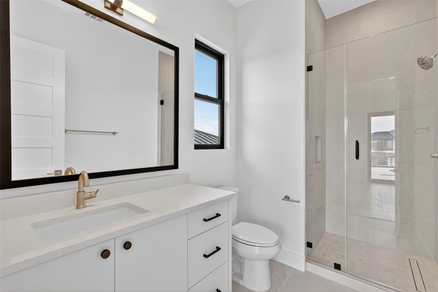 Furnished interior view inside a new home in Milky Way at River Place, Austin (Image 12).