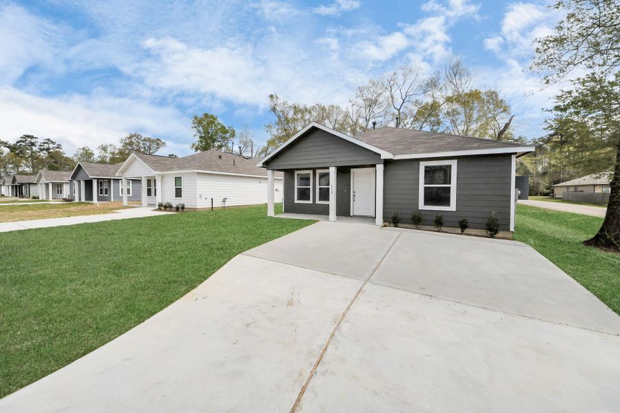 Front exterior of a new home in , Cleveland, TX, highlighting curb appeal (Image 2). Front exterior of a new home in , Cleveland, TX, highlighting curb appeal (Image 2).