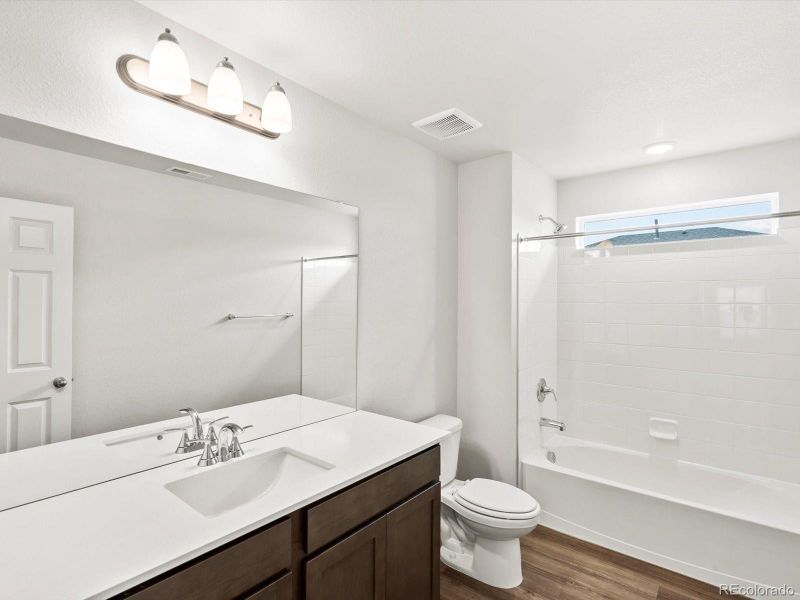 Furnished interior view inside a new home in Buffalo Highlands: The Flora Collection, Commerce City (Image 8).