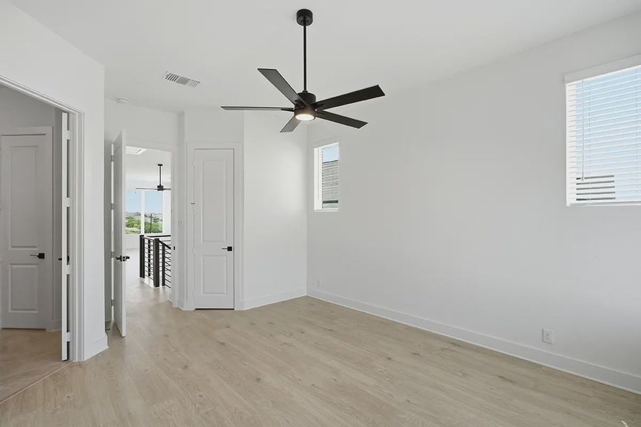 Representative unfurnished interior of a home built from the Athena by Chesmar Homes in Prominence Urban, San Antonio (Image 31).