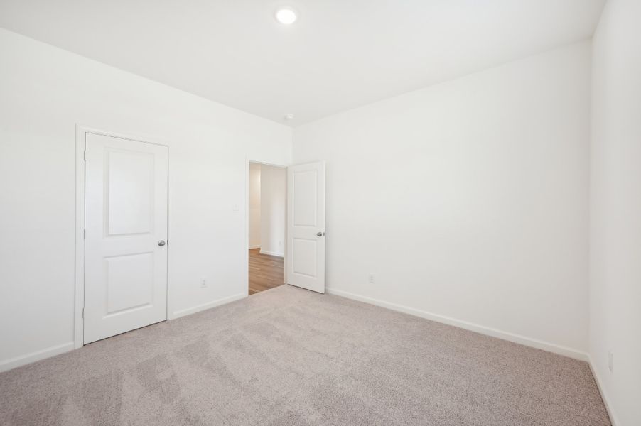 Representative unfurnished interior of a home built from the Firefly by Starlight Homes in Noble Ridge, Howe (Image 17).