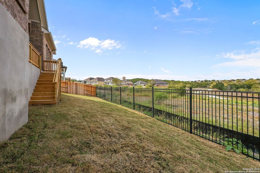 Exterior details and patio area of a home in Homestead 75', Schertz (Image 22).