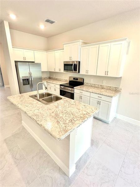 Furnished interior view inside a new home in Oak Hill Plantation, Ocala (Image 3). Furnished interior view inside a new home in Oak Hill Plantation, Ocala (Image 3).