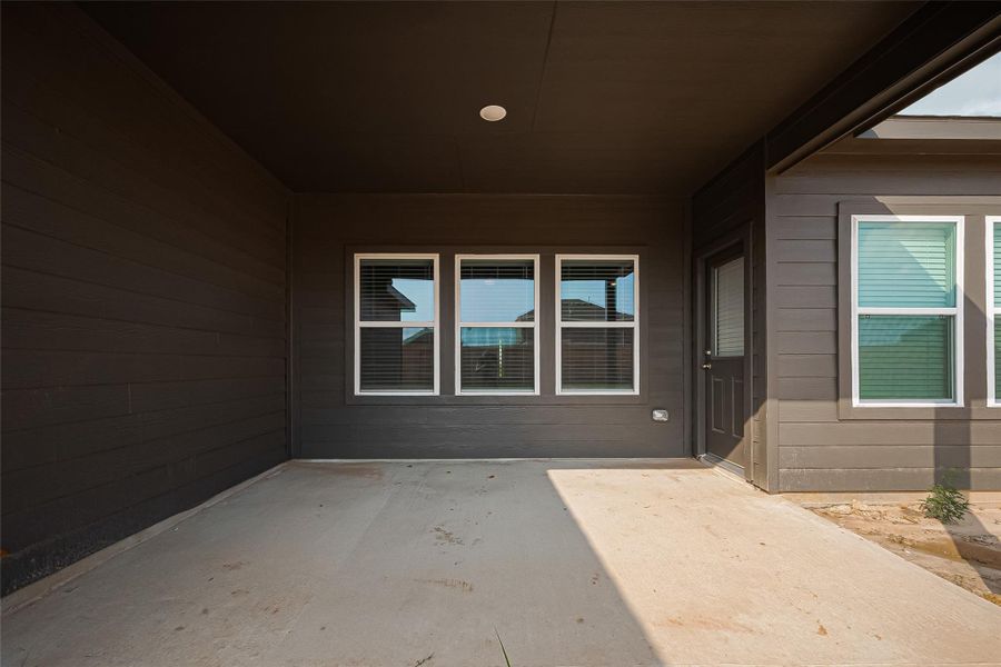 Exterior details and patio area of a home in Sunterra, Katy (Image 2). Exterior details and patio area of a home in Sunterra, Katy (Image 2).