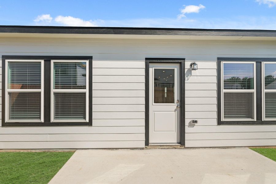 Exterior details and patio area of a home in Northpark South, Porter (Image 4). Exterior details and patio area of a home in Northpark South, Porter (Image 4).